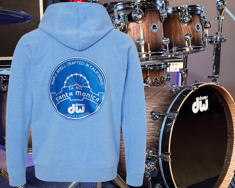 Blue DW hoodie with DWe kit in background